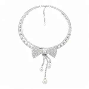 Elegant diamond and pearl bow choker necklace with dangle pearls for evening dresses