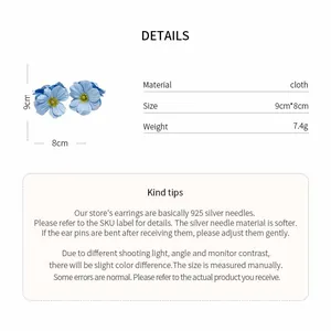 Spécifications détaillées de la pince à cheveux fleur en tissu bleu avec dimensions.