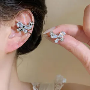 Detailed view of exquisite silver zircon butterfly and flower ear cuff for non-pierced ears