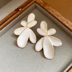 Vintage white enamel flower stud earrings with gold plating and S925 silver needles
