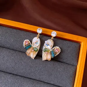 Vintage heart-shaped stud earrings featuring colorful crystals and premium silver needles