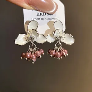 Elegant white enamel flower earrings with pink pearl tassels and silver needles, chic jewelry