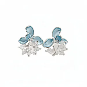 Sweet light blue oil-drop flower stud earrings with sparkling clear crystal accents