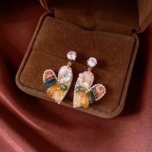 Luxury vintage heart-shaped earrings featuring colorful crystals and white pearls