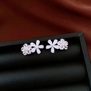 Elegant silver flower stud earrings with zircon and white resin for women