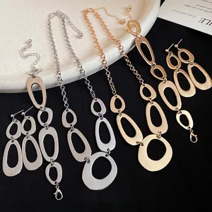 Elegant gold and silver irregular oval linked necklace, bracelet and earring jewelry set