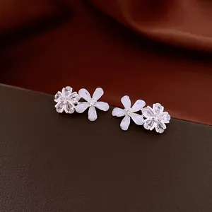 Elegant vintage silver needle stud earrings with zircon and resin flower design for women