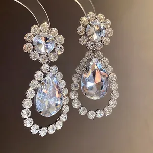 Luxury silver needle teardrop crystal drop earrings with sparkling rhinestone clusters