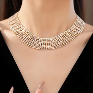 Detailed view of an elegant multi-layer rhinestone choker necklace worn by a model.