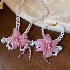 Elegant jewelry set with sweet pink chiffon flowers and white pearl beaded necklace and bracelet