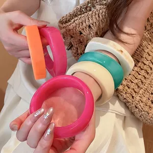 Stylish chunky resin geometric irregular bangles in vibrant colors for women