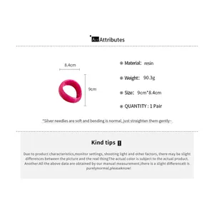 Detail view of pink resin geometric irregular bracelet with dimensions 9cm by 8.4cm