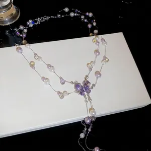 Elegant Korean style purple butterfly tassel necklace featuring faux pearls and rhinestones.