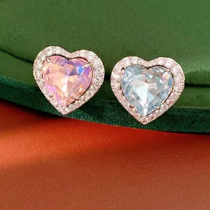 Elegant heart-shaped zircon open ring with micro-pave crystals in a luxury style.