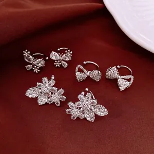 Luxury zircon butterfly and bow ear cuffs for non-pierced ears on red background