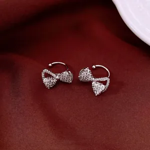 Sparkling zircon bow-shaped ear cuffs for non-pierced ears in a luxury design
