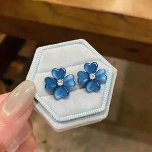 Blue cat eye stone flower stud earrings with zircon and silver needles