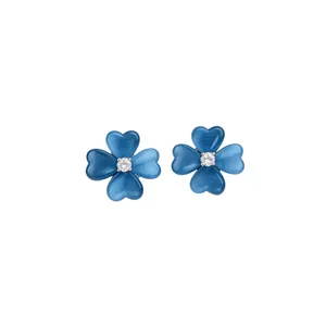 Elegant blue cat's eye stone flower stud earrings with a sparkling central zircon
