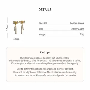 Gros plan boucles d'oreilles nœud doré avec dimensions, matériaux et conseils de soin
