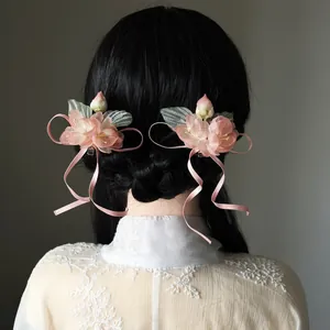 Handmade pink floral ribbon bow side hair clips for elegant ancient Hanfu hairstyle