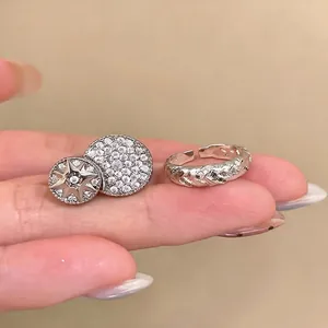 Elegant silver twisted rope open ring set with pavé zircon star motif