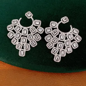 Elegant geometric square stud earrings with luxury shimmering zircons in silver finish