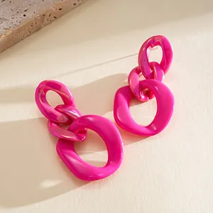 Detailed view of vibrant magenta acrylic chain link geometric drop earrings for women