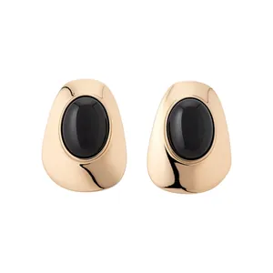 Elegant vintage minimalist gold-tone stud earrings with oval black stones for women