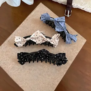Set aus drei Haarspangen mit gepunkteten Stoffschleifen in Blau, Beige und Schwarz