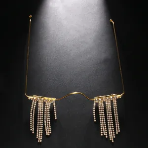 Detailed view of luxury gold half-frame glasses with shimmering rhinestone tassel drops
