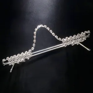 Close-up detail of a sparkling rhinestone half-frame decorative eyeglass accessory with chain