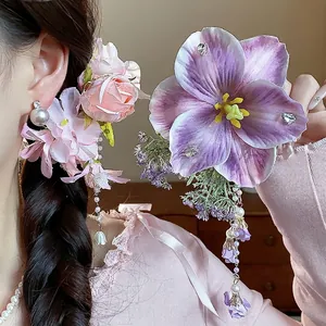 Handmade floral hair clips with pearl tassels and crystal accents for women