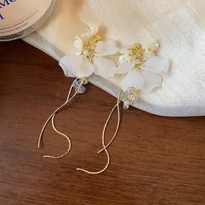 Elegant French style white flower tassel earrings with golden finish for women