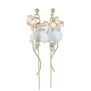 Elegant French style floral tassel earrings with delicate pearls and gold-tone finish