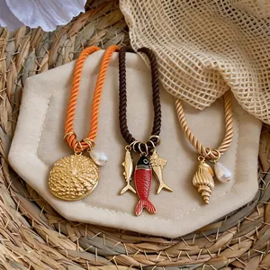 Nautical style braided rope necklaces with fish, shell and pearl pendants, colorful set
