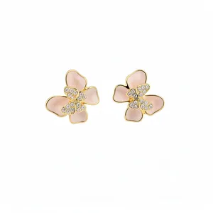 Elegant pink enamel butterfly stud earrings with sparkling crystals in a polished gold finish
