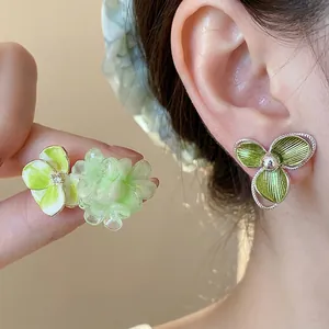 18k gold plated silver needle flower stud earrings with green zircon in light luxury style