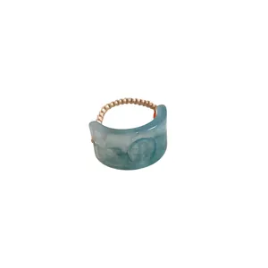 Elegant vintage light blue resin ring with embossed Fu character and adjustable braided rope