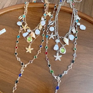 Multi-layered vintage necklace with pearl shell and starfish charms for beach vacation
