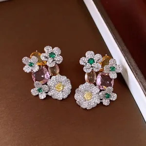 Elegant vintage style floral stud earrings with sparkling cubic zirconia and colored stones