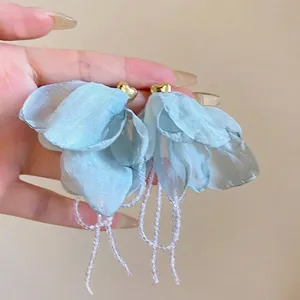 Elegant light blue mesh flower earrings featuring white beaded tassels and golden heart studs