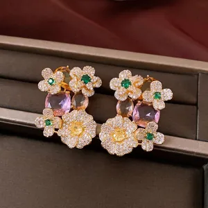 Elegant vintage-style zircon flower oval stud earrings with multi-colored gemstones.