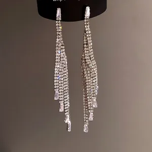 Elegant long tassel earrings with sparkling zircons and silver needles for stylish women.