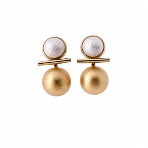 Brushed gold and pearl geometric drop stud earrings on a clean white background