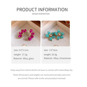 Detailed size and material specifications for vintage floral rhinestone earrings in gold.