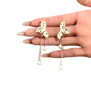 Colorful iris butterfly tassel earrings with faux pearls and summer dopamine style.