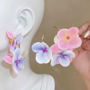 Elegant sweet fabric flower drop earrings with silver pins for a stylish vacation look