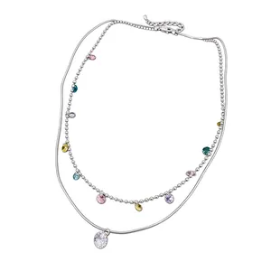 Vintage double-layer silver-toned necklace featuring colorful teardrop zircons and a round crystal