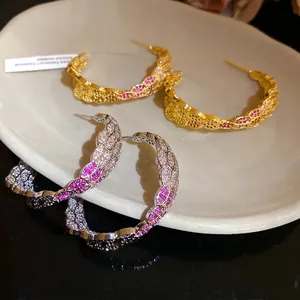 Exquisite vintage zircon C-shaped hoop earrings with gold and silver finish details