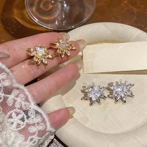 French vintage sunflower stud earrings with shiny crystals in gold and silver finishes